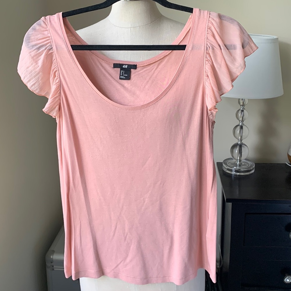 Versatile, sheer sleeve top
